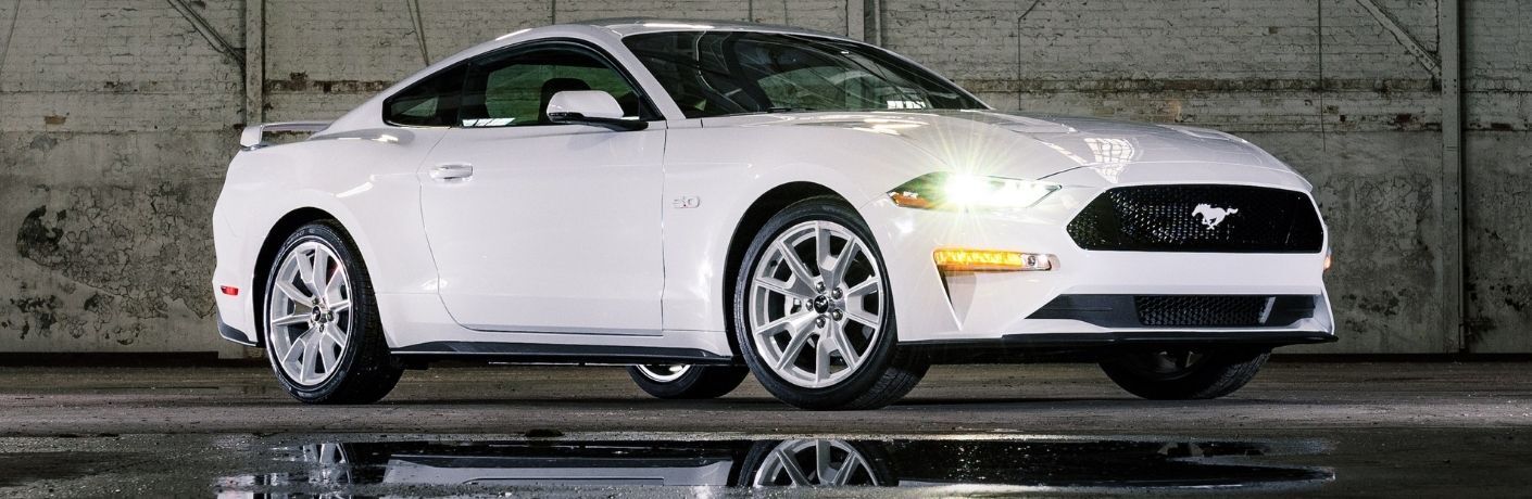 White 2022 Ford Mustang Ice White Edition Front Exterior in a Warehouse