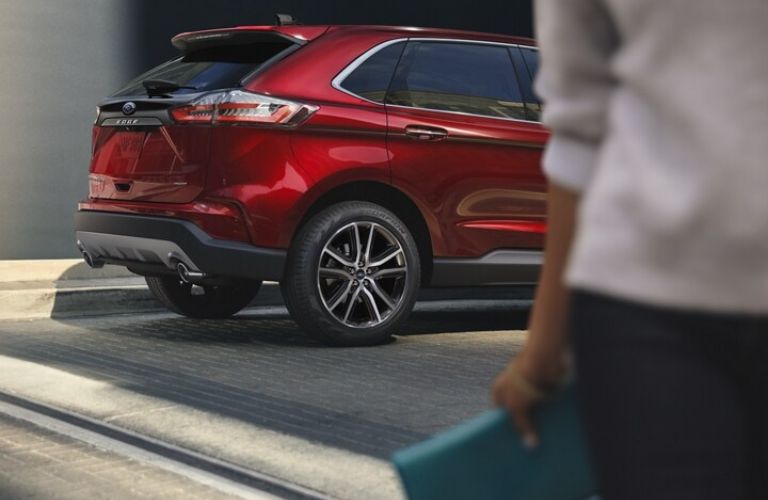 Red 2024 Ford Edge Rear Exterior with Woman in Foregraund