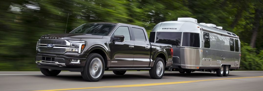 Gray 2024 Ford F-150 Towing an Airstream Trailer