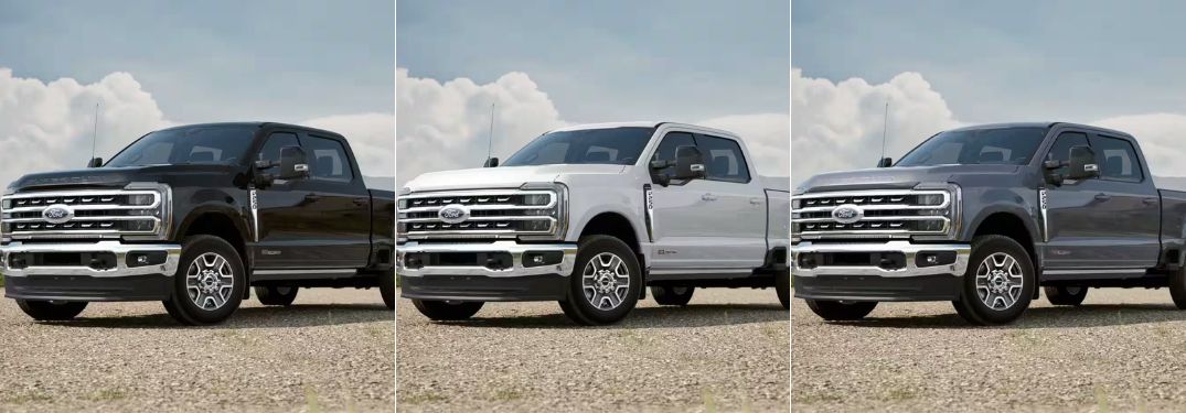 Agate Black, Oxford White and Carbonized Gray 2024 Ford Super Duty Models on a Farm