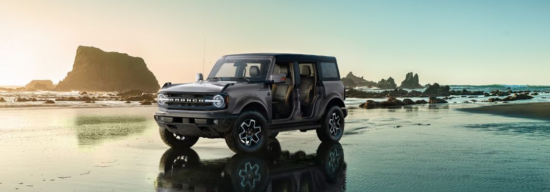 Gray 2024 Ford Bronco on a Wet Sand Beach