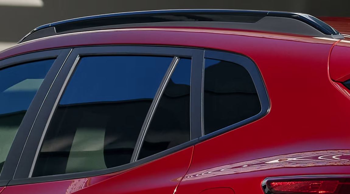 crimson red 2024 Chevrolet Trax; image focused on side rails on the roof of the vehicle