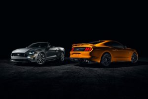 two 2019 Ford Mustang models parked next to each other