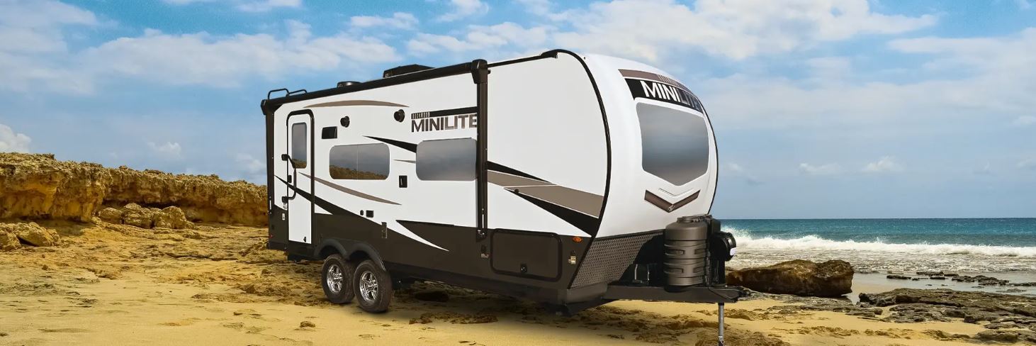 Rockwood Mini Lite Travel Trailer parked on a beach