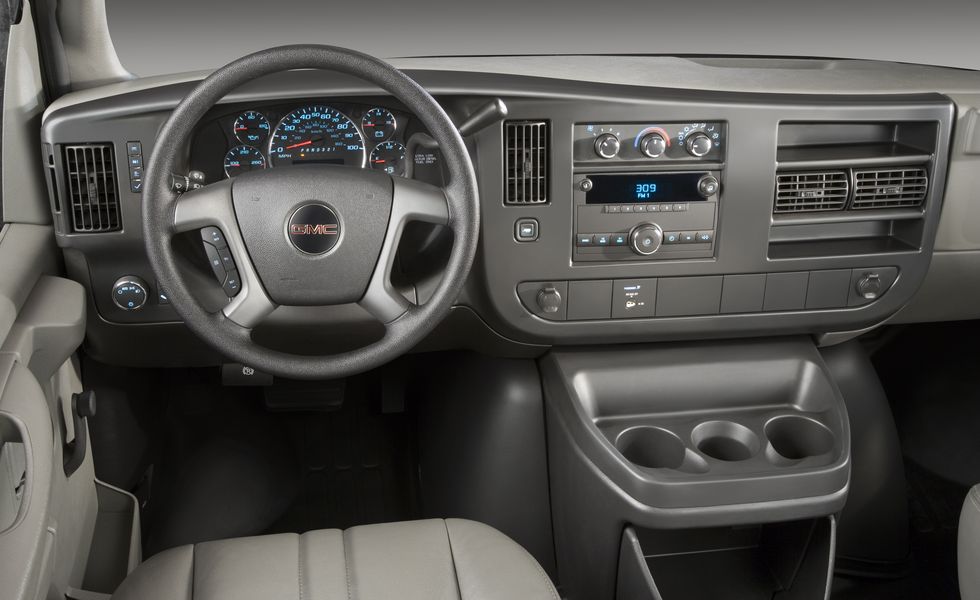 Interior perspective of GMC wheel and dashboard. 