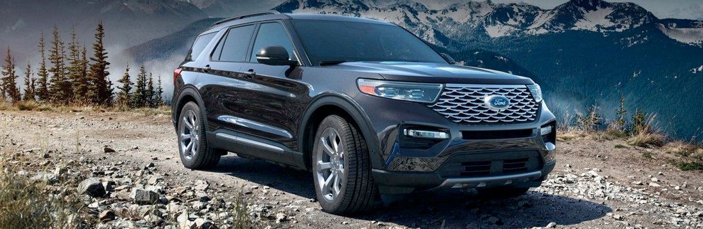 side view of a black 2021 Ford Explorer Hybrid