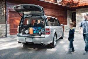 rear view of a silver 2019 Ford Flex with its rear cargo door open