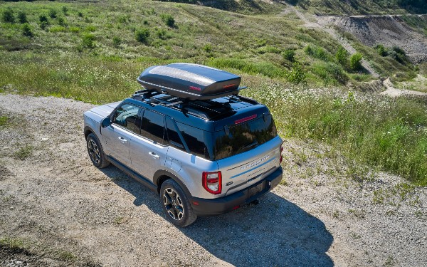 side view of a silver 2021 Ford Bronco Sport with a roof cargo hold