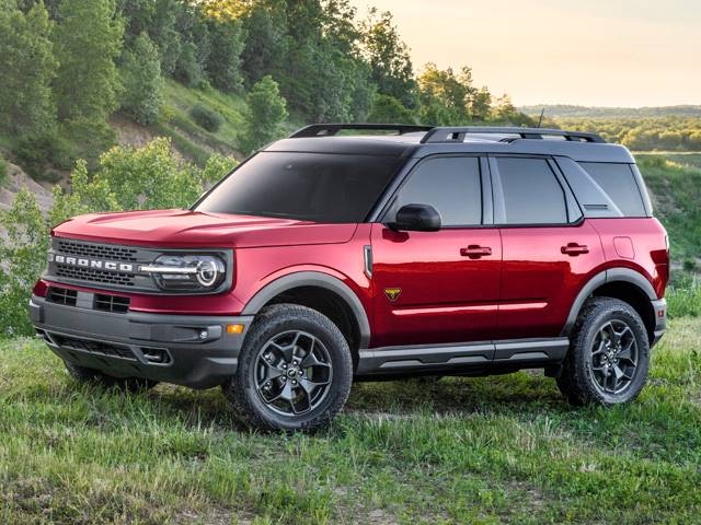 red ford bronco sport on grass