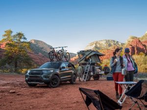 family at a campsite with a 2021 Ford Explorer Timberline