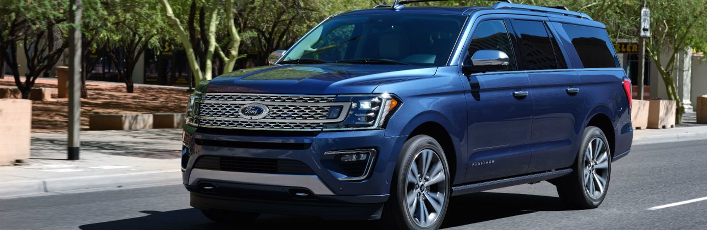 side view of a blue 2021 Ford Expedition Platinum