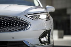 close up of the front of a white 2019 Ford Fusion