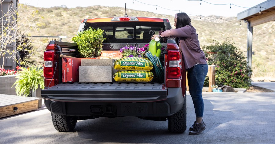 woman loading the back of her 2022 Ford Maverick