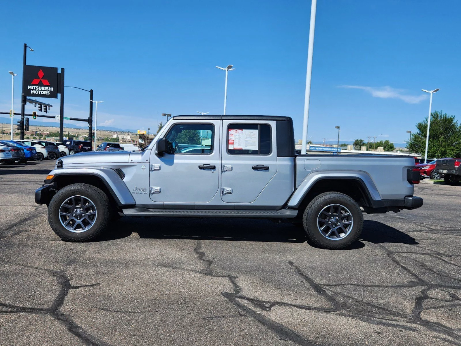 Used 2021 Jeep Gladiator Overland with VIN 1C6HJTFG8ML527673 for sale in Pueblo, CO