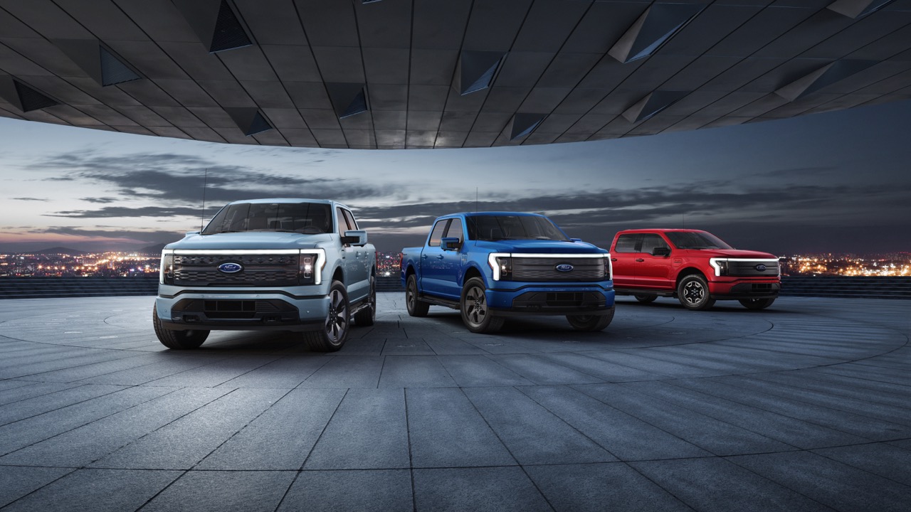 2023 Ford F-150 Lightning Gray Blue Red in Dark Cityscape