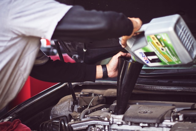 Man Changing Oil