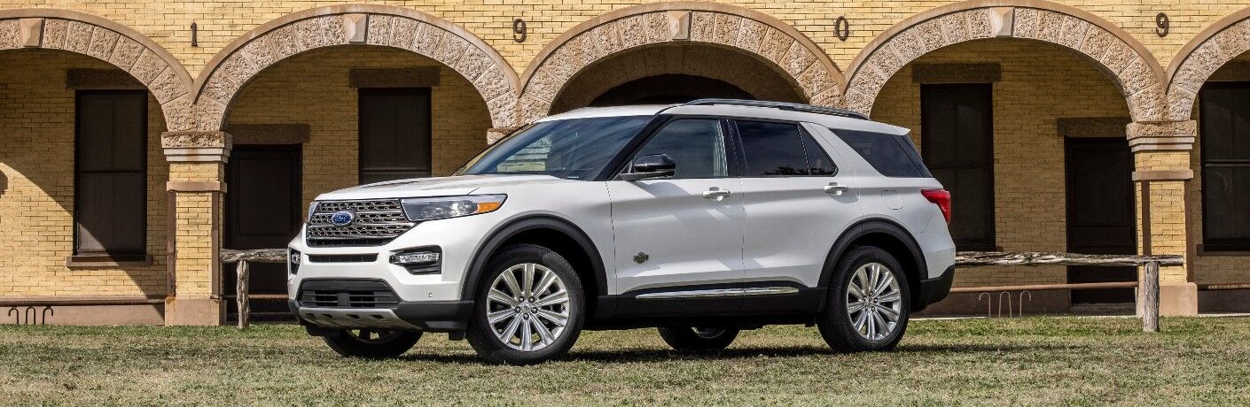 side view of a white Ford Explorer