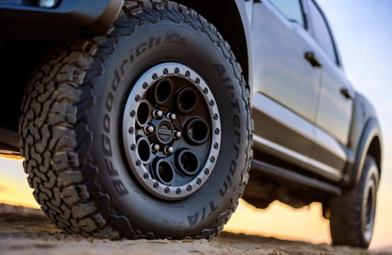 Close Up of 2024 Ford F-150 Raptor Wheels in Sand