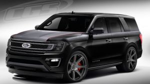 Custom 2018 Ford Expedition featuring black exterior tinted windows and red brakes