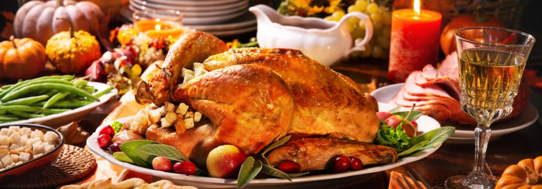 Close Up of Thanksgiving Turkey and Food on a Table