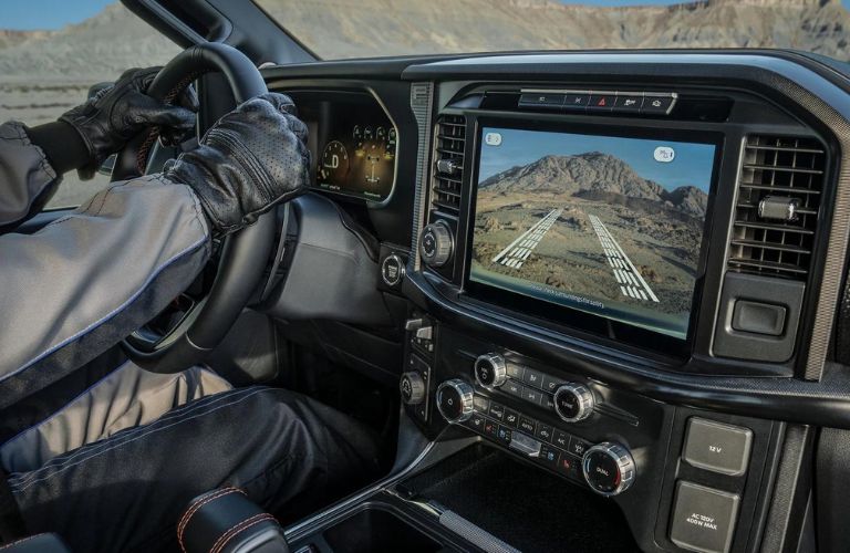 2025 Ford F-150 Touchscreen Display with Trail Cam and Man Driving