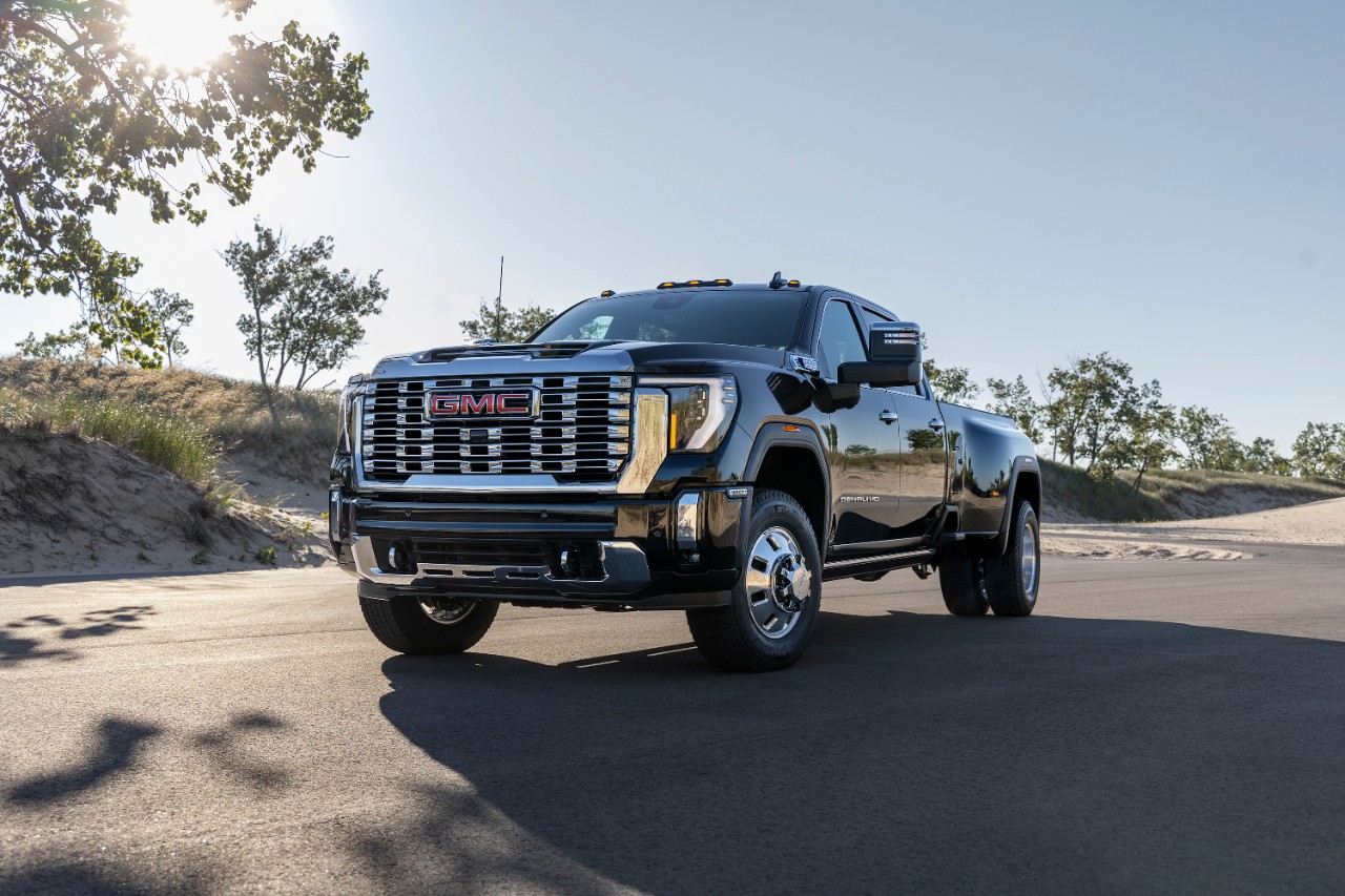 a black gmc truck our in the nature