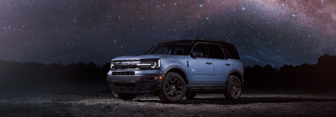 Blue 2024 Ford Bronco Sport with Black Appearance Package in a Desert Under the Stars