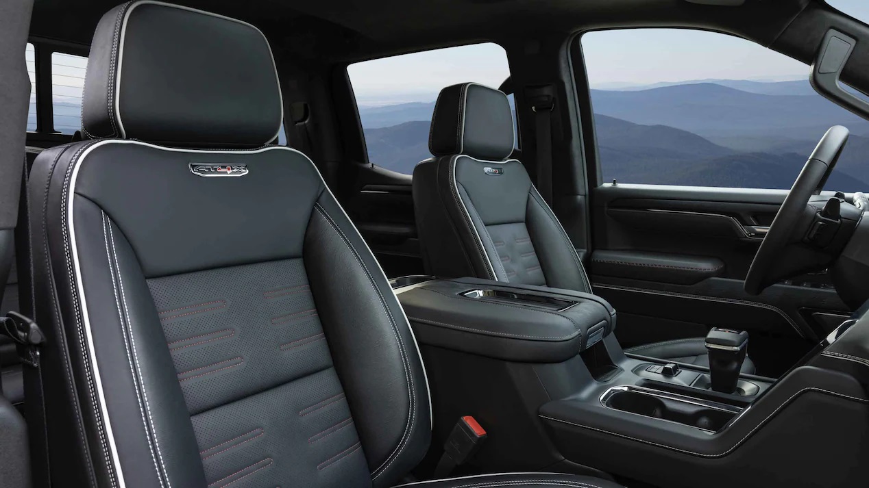 Interior: Black leather seats with double-needle white stitching