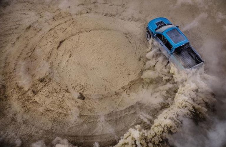 aerial view of a blue 2021 Ford F-150 Raptor