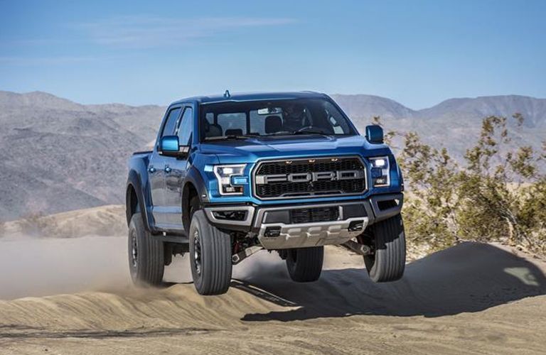 front view of a blue 2021 Ford F-150 Raptor