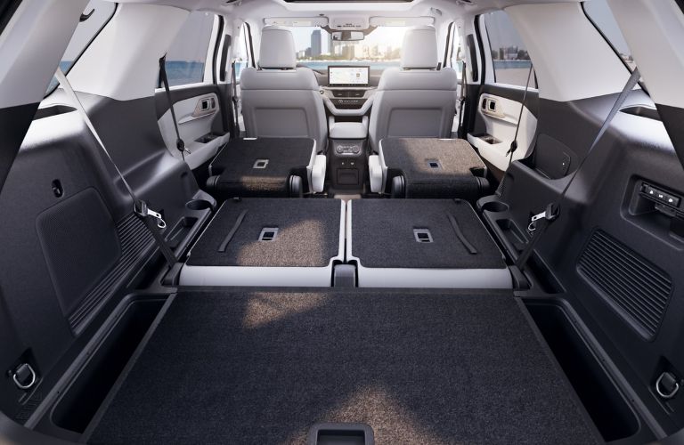 Rear of 2025 Ford Explorer with Seats Laid Flat in Cargo Area