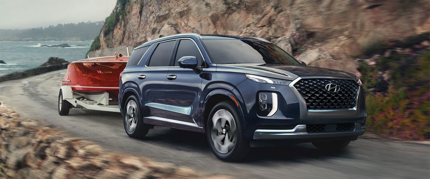 The 2021 Hyundai Palisade pulling a boat.