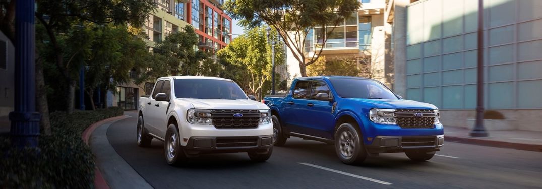 White and Blue 2024 Ford Maverick Models on a City Street