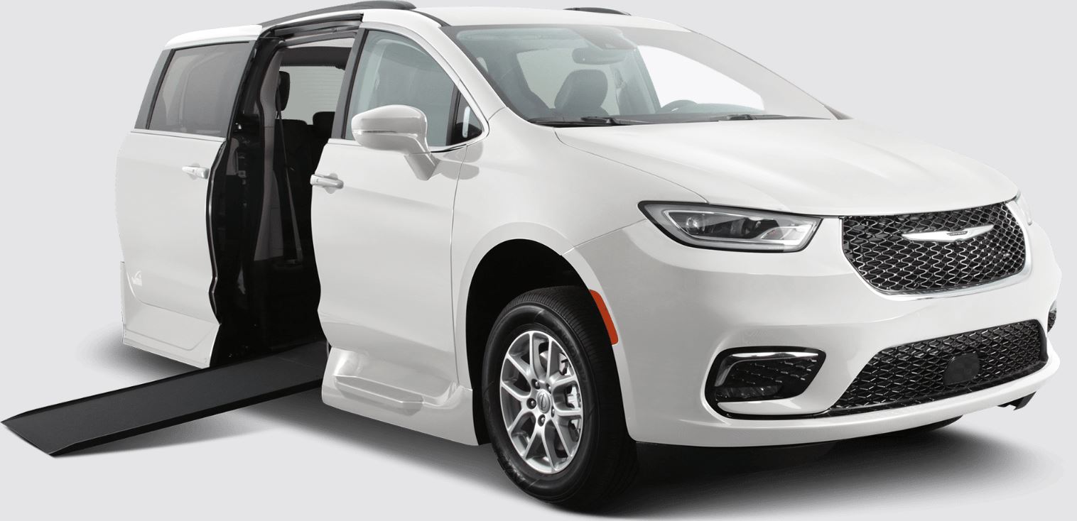 white Chrysler mobility van with ramp extended