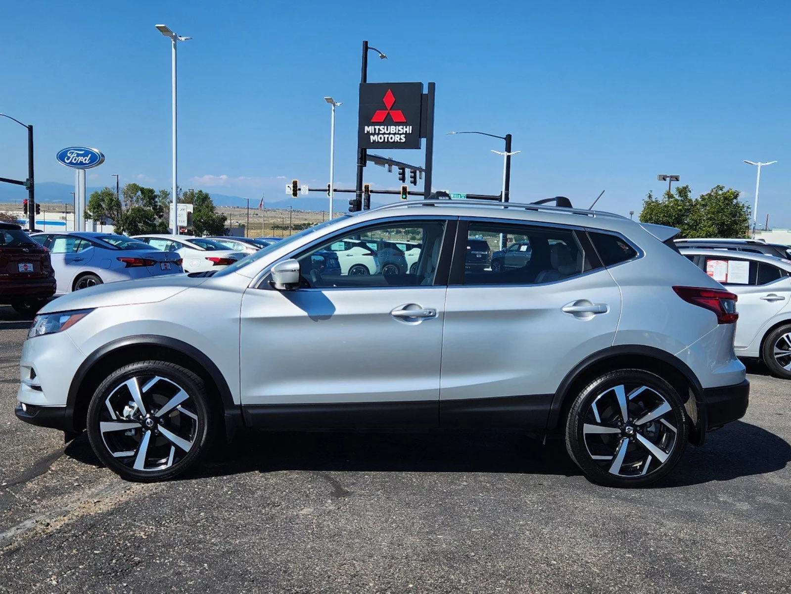 Used 2022 Nissan Rogue Sport SL with VIN JN1BJ1CW5NW498828 for sale in Pueblo, CO