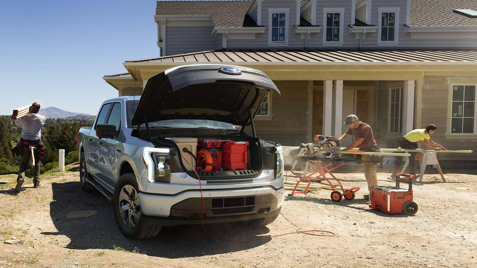 A grey 2022 F-150 Lightning with the hood open