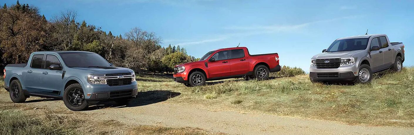 Three 2022 Ford Maverick pickup trucks parked by each other