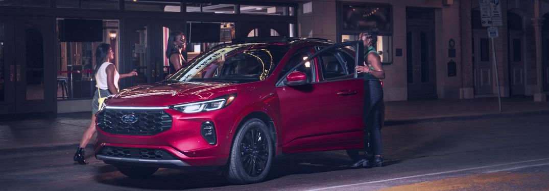 Red 2024 Ford Escape on a City Street at Night