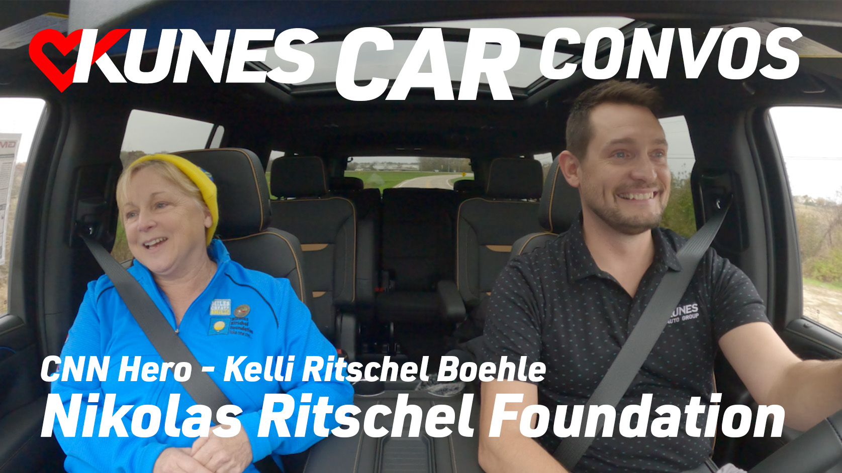 Pictured left to right: Kelli Ritschel Boehle, founder of Nik's Wish, with Scott Wolf, General Manager of Kunes GMC of Belivdere, IL, inside of a 2024 GMC Yukon XL AT4; Text reads: Kunes Car Convos; CNN Hero - Kelli Ritschel Boehle; Nikolas Ritschel Foundation