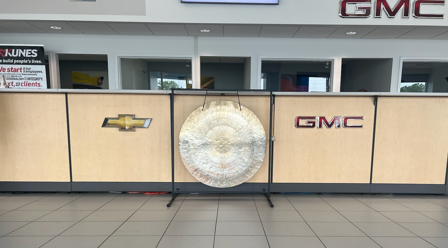 large gong inside of Kunes Chevrolet GMC of Elkhorn, WI dealership