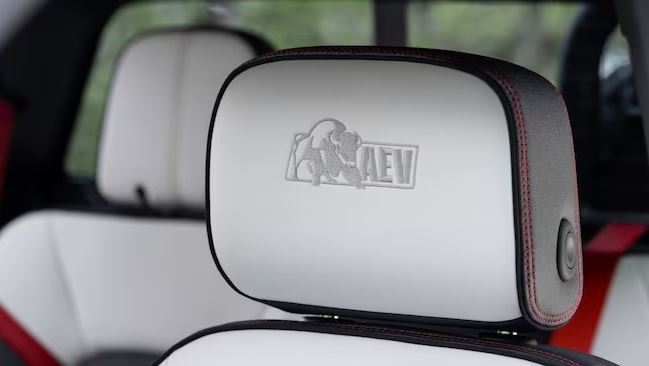 gray-white with black trim and red stitched 2024 Canyon AT4X AEV (American Expedition Vehicles) branded headrest