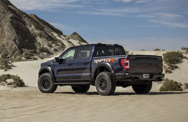 Dark Blue 2024 Ford F-150 Raptor R Rear Exterior in the Desert