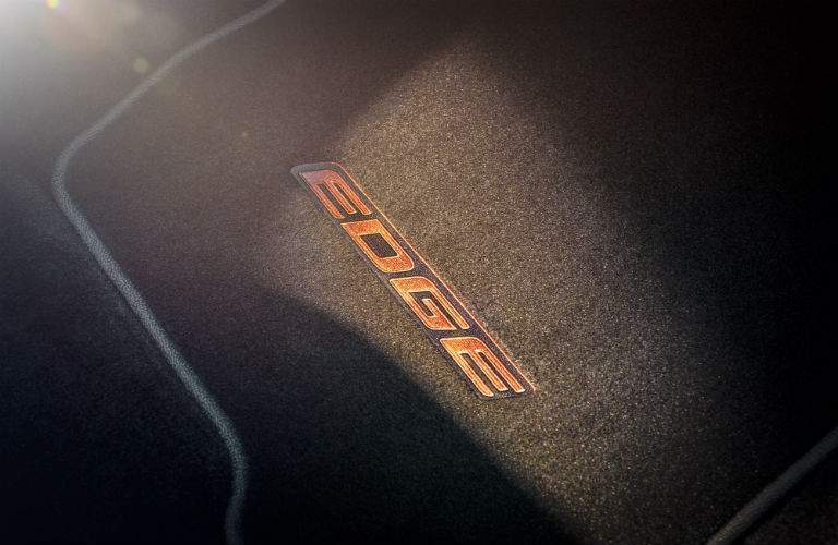2018 Ford Edge SEL front interior floor mats and logo