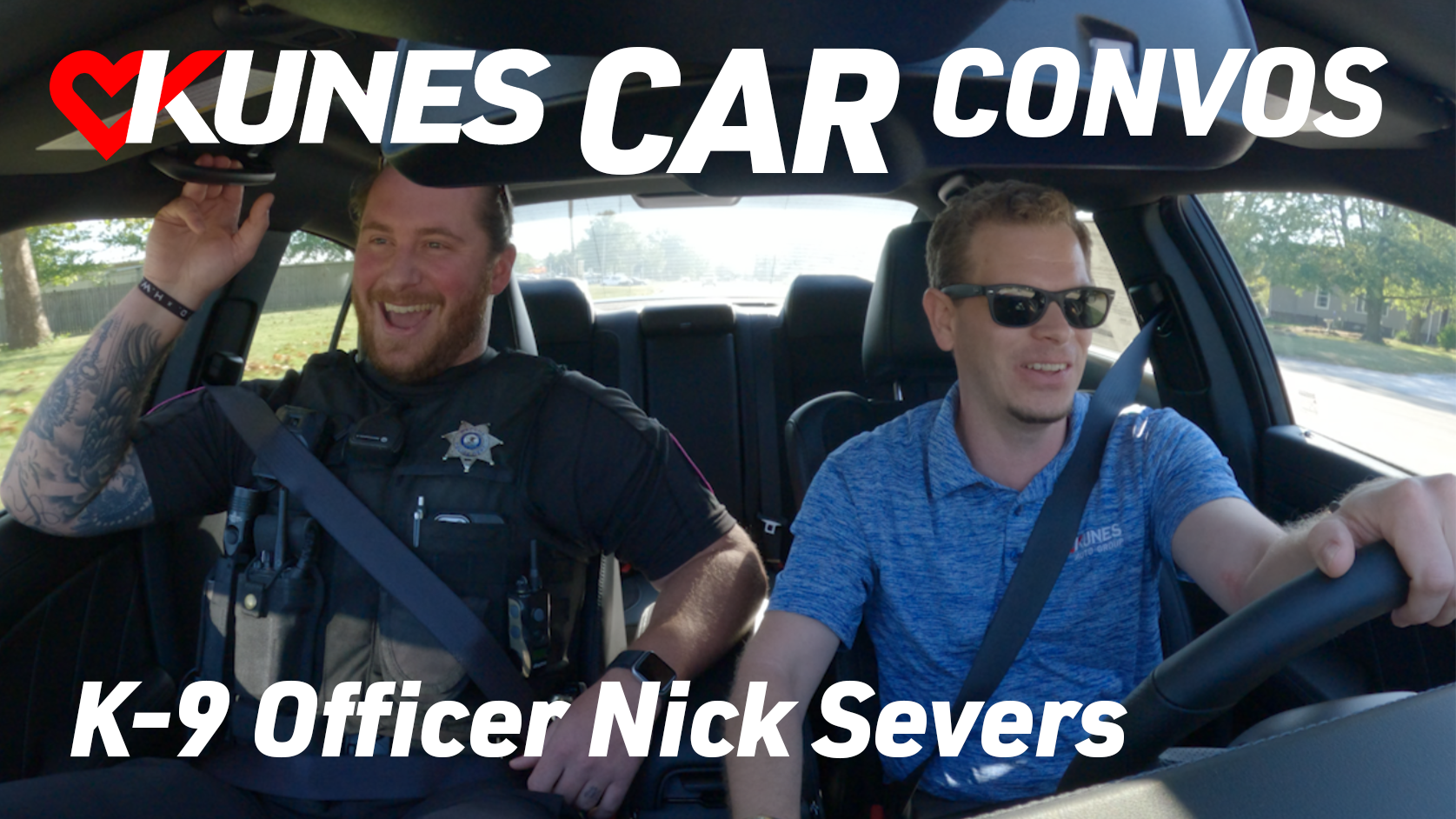 Pictured left to right: Macomb Police Officer Nick Severs and General Manager of Kunes Auto Group of Macomb, Royce Lee; Text reads: Kunes Car Convos, K-9 Officer Nick Severs