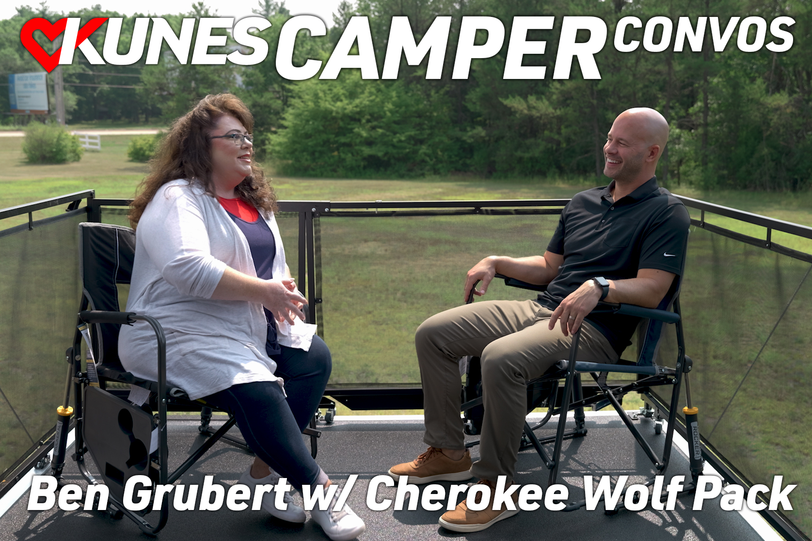 Lisa Rosue, Kunes RV marketing manager, and Ben Grubert from Cherokee Wolf Pack, on the back patio of a 2023 Cherokee Wolf Pack 4500PACK14D; Text says: Kunes Camper Convos, Ben Grubert w/Cherokee Wolf Pack