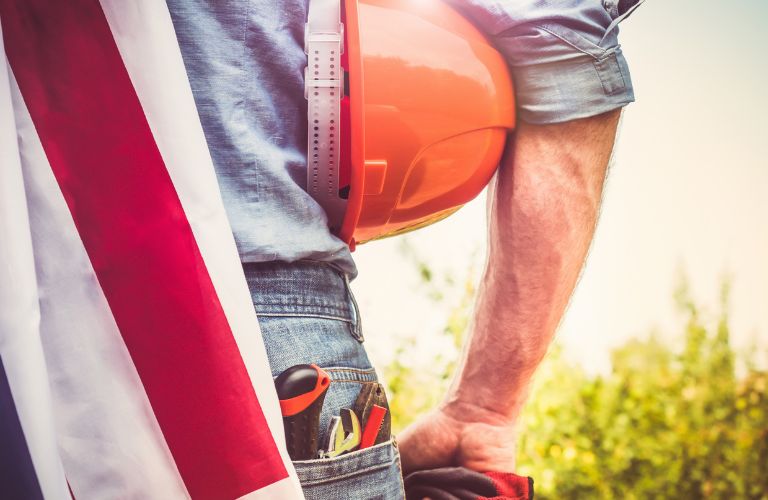 Man with Hardhat and American Flag