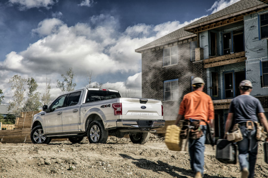 rear view of a silver 2021 Ford F-150 at a jobsite
