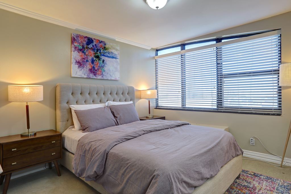 Bedroom inside a senior memory care apartment.