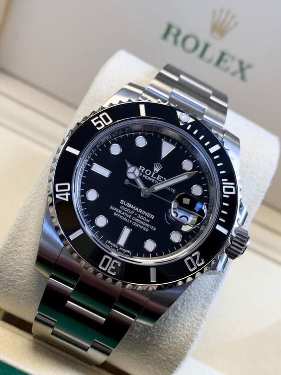 cartier roadster vs rolex submariner