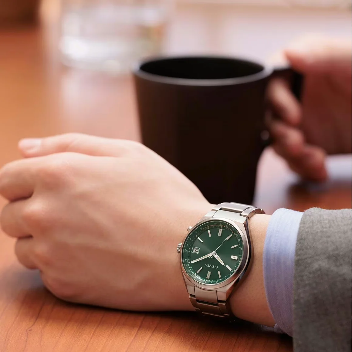 Citizen CB1160-55W Super Titanium Eco-Drive Radio Controlled horloge met groene wijzerplaat en titanium schakelband